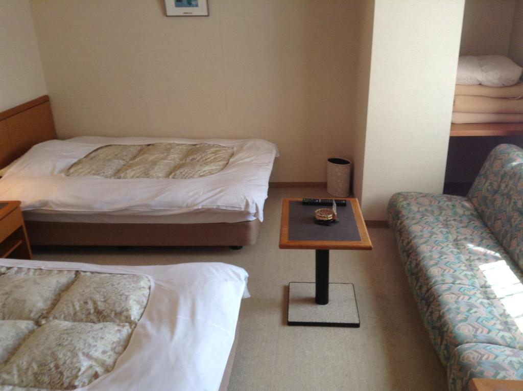 Hotel Bergtour Marukita à Hakuba Extérieur photo