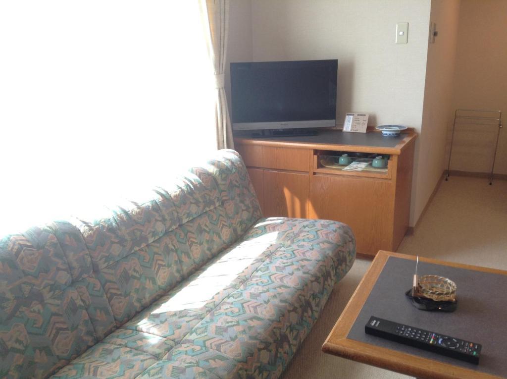 Hotel Bergtour Marukita à Hakuba Extérieur photo
