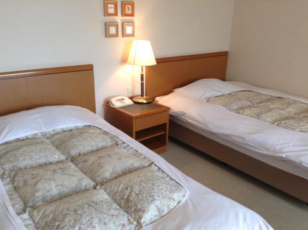 Hotel Bergtour Marukita à Hakuba Extérieur photo