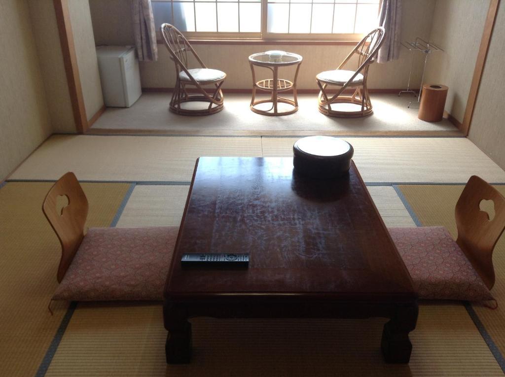 Hotel Bergtour Marukita à Hakuba Extérieur photo