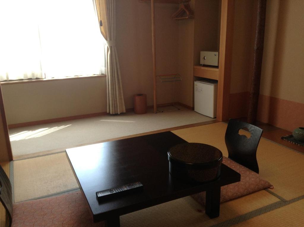 Hotel Bergtour Marukita à Hakuba Extérieur photo