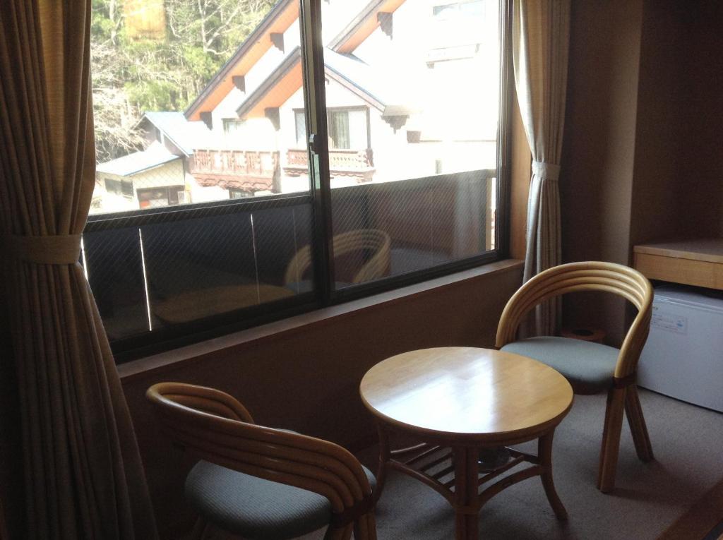 Hotel Bergtour Marukita à Hakuba Extérieur photo