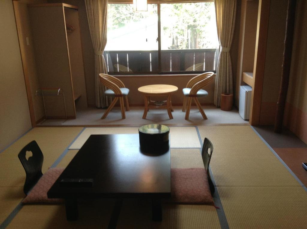 Hotel Bergtour Marukita à Hakuba Extérieur photo