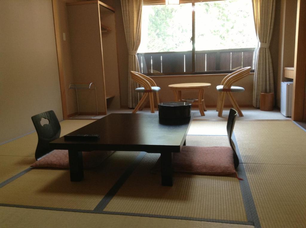 Hotel Bergtour Marukita à Hakuba Extérieur photo