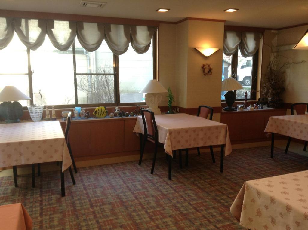 Hotel Bergtour Marukita à Hakuba Extérieur photo