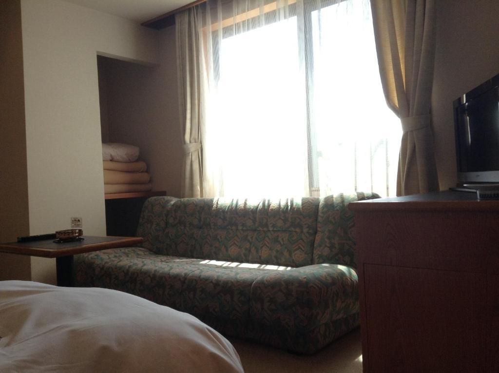 Hotel Bergtour Marukita à Hakuba Extérieur photo